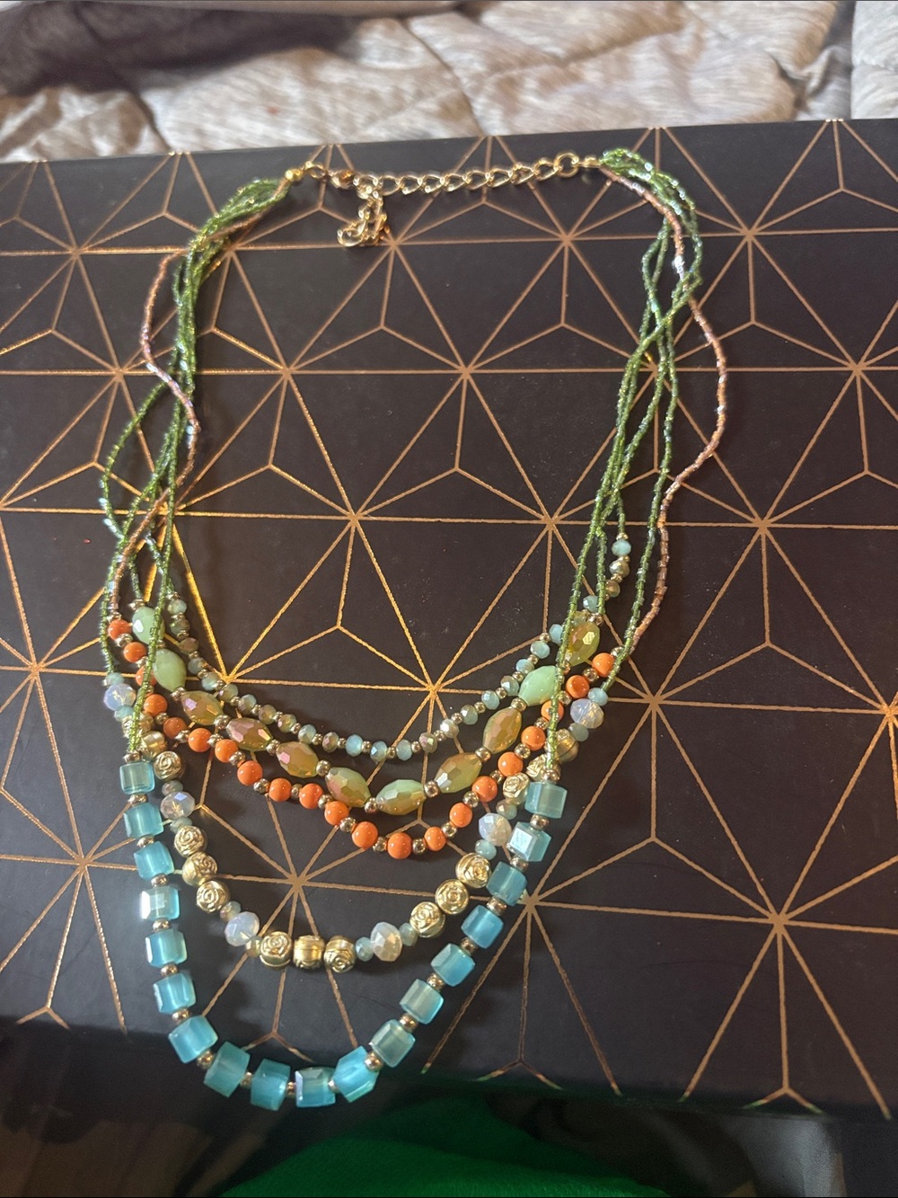 Multi-Strand Green Beaded Necklace with Blue and Coral Accents